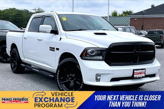 2018 RAM 1500 Night in Bright White Clearcoat — front three-quarter view