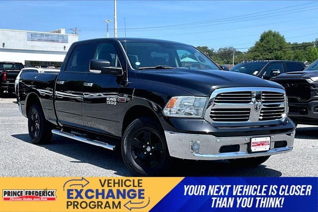 2016 RAM 1500 Big Horn in Brilliant Black Crystal Pearlcoat — front three-quarter view