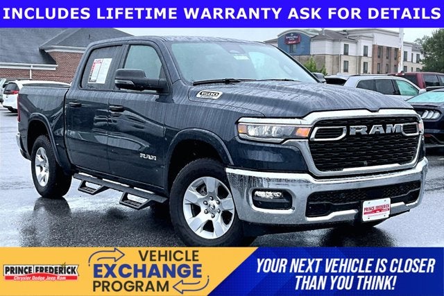 2025 RAM 1500 Big Horn Crew Cab 4x4 5'7' Box in Forged Blue Metallic — front three-quarter view