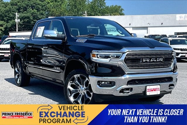 2019 RAM 1500 Limited Crew Cab 4x4 5'7' Box in Diamond Black Crystal Pearlcoat — front three-quarter view