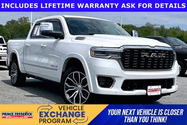 2025 RAM 1500 Tungsten Crew Cab 4x4 5'7' Box in Ivory White Tri-Coat Pearlcoat — front three-quarter view