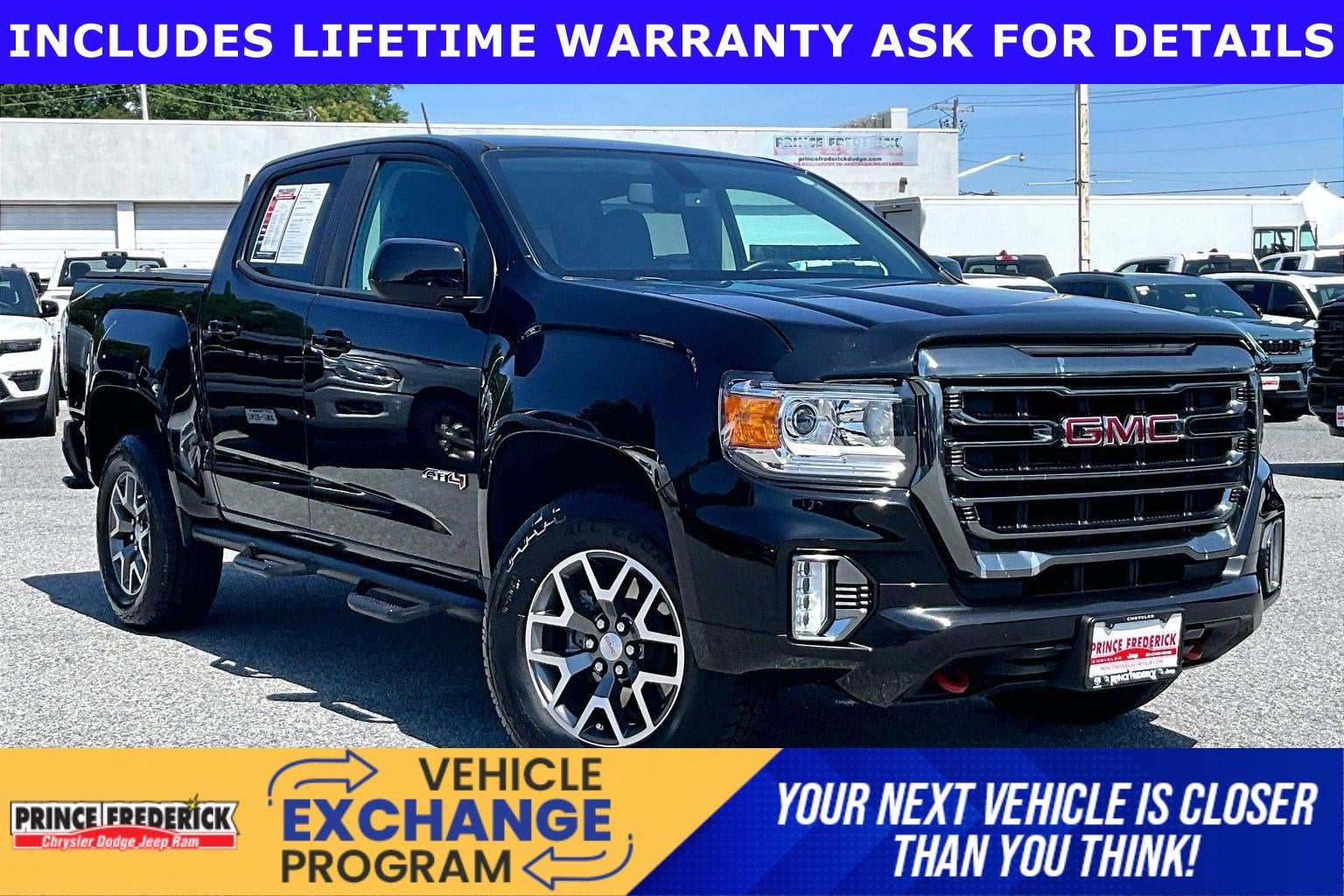 2022 GMC Canyon 4WD Crew Cab Short Box AT4 - Leather in Onyx Black — front three-quarter view