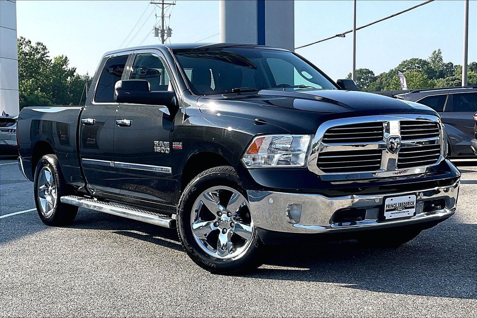 2017 RAM 1500 Big Horn in Brilliant Black Crystal Pearlcoat — front three-quarter view