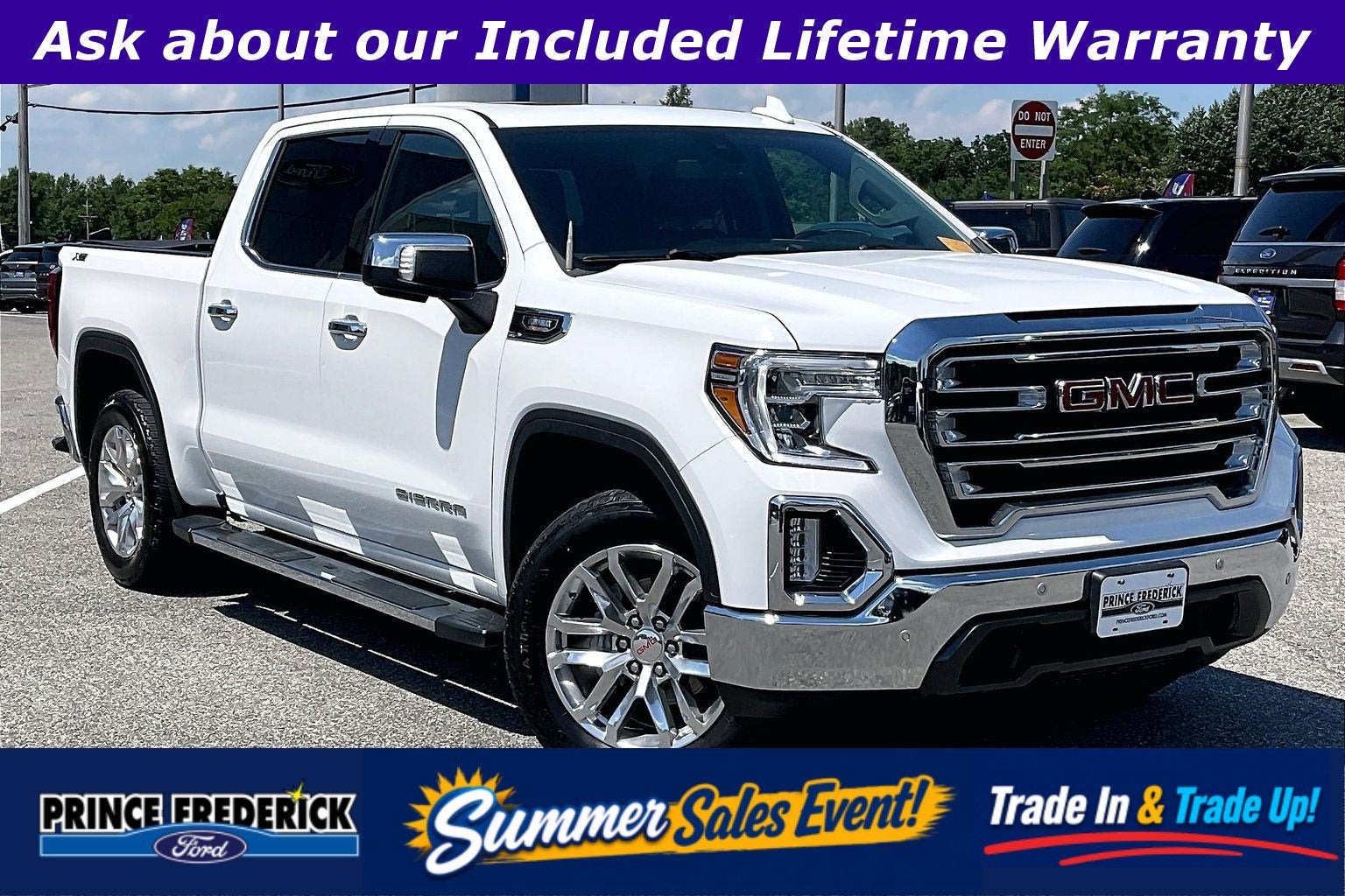 2021 GMC Sierra 1500 SLT in Summit White — front three-quarter view