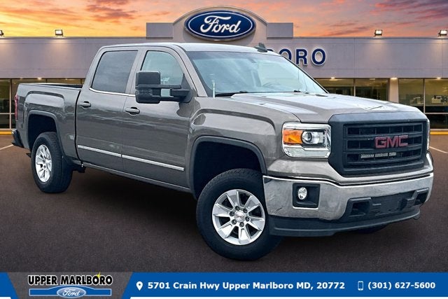2015 GMC Sierra 1500 SLE in Bronze Alloy Metallic — front three-quarter view