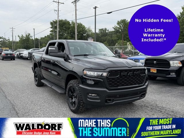 2025 RAM 1500 Warlock in Diamond Black Crystal Pearlcoat — front three-quarter view