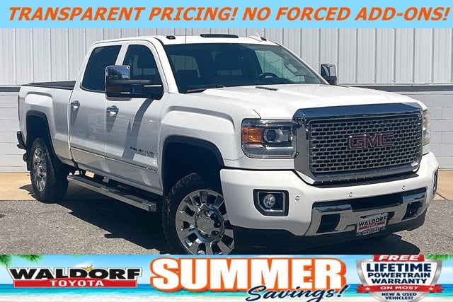 2016 GMC Sierra Denali in Summit White — front three-quarter view