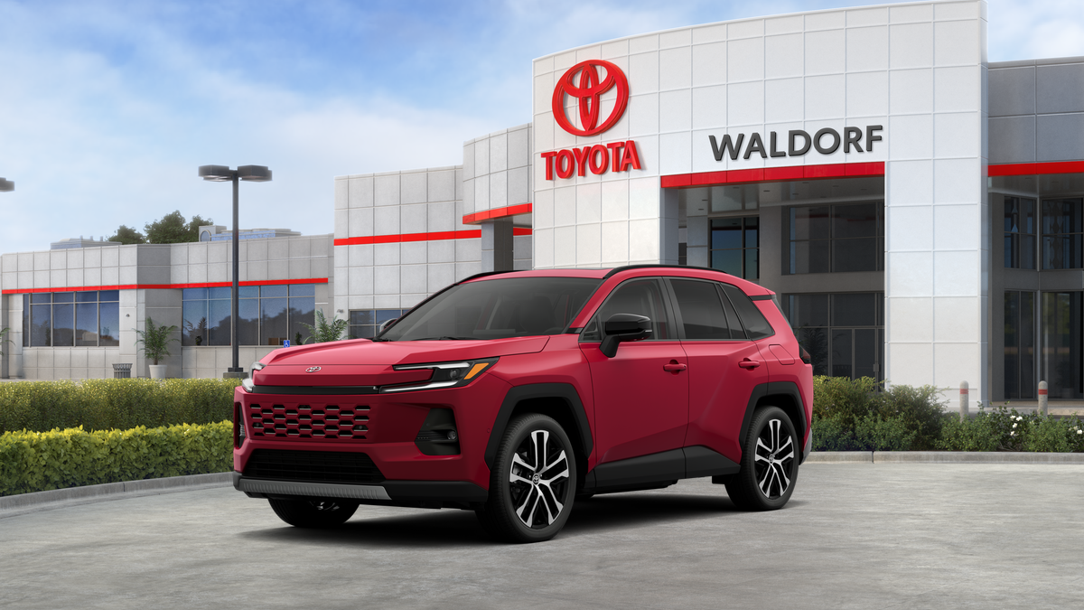 2026 Toyota RAV4 Limited in Ruby Flare Pearl — front three-quarter view
