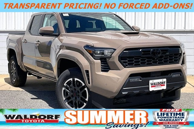 2026 Toyota Tacoma TRD Sport in Mudbath — front three-quarter view