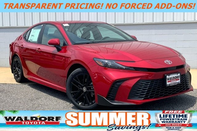 2026 Toyota Camry SE in Supersonic Red — front three-quarter view