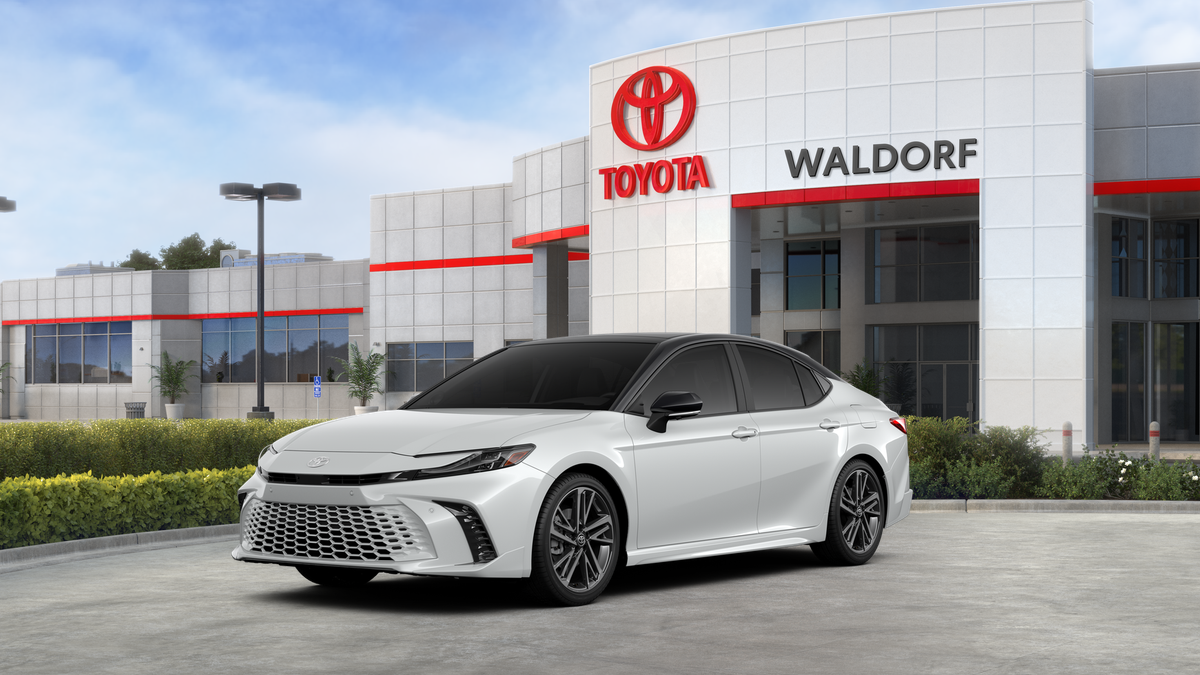 2026 Toyota Camry XSE in Wind Chill Pearl With Midnight Black Metallic Roof — front three-quarter view