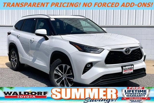 2026 Toyota Highlander XLE in Wind Chill Pearl — front three-quarter view