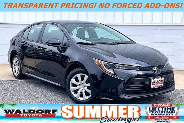 2026 Toyota Corolla LE in Midnight Black Metallic — front three-quarter view