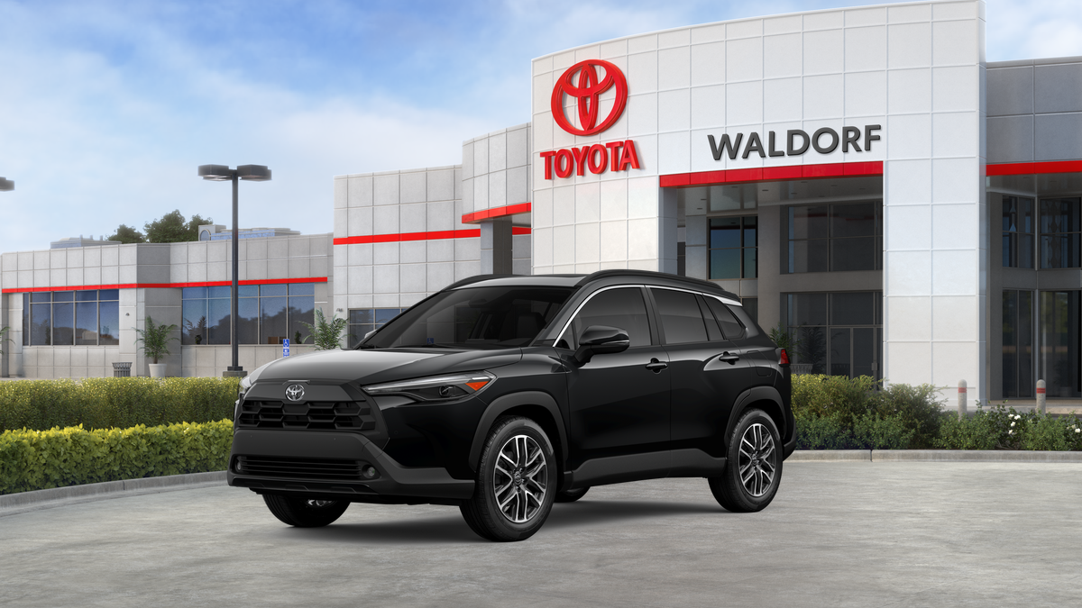 2026 Toyota Corolla Cross XLE in Jet Black — front three-quarter view